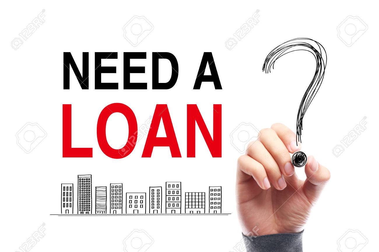 A person holding a marker to draw a large question mark next to the text "Need a Loan?" with a cityscape illustration at the bottom.