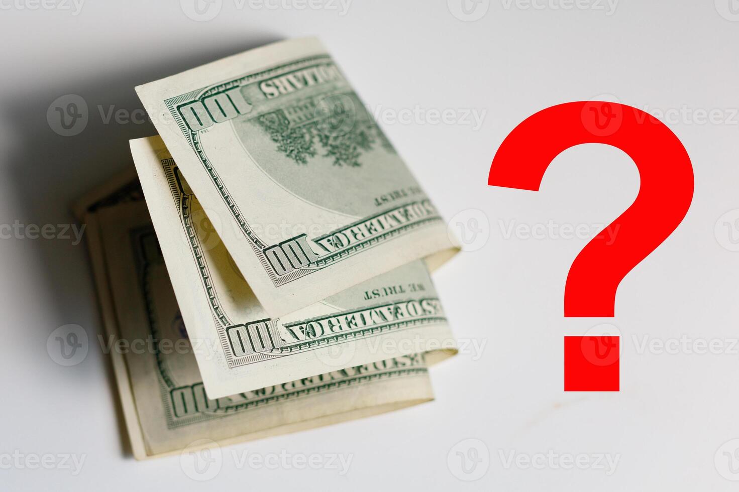 A stack of hundred-dollar bills with a large red question mark next to it, suggesting a question about money or cost.