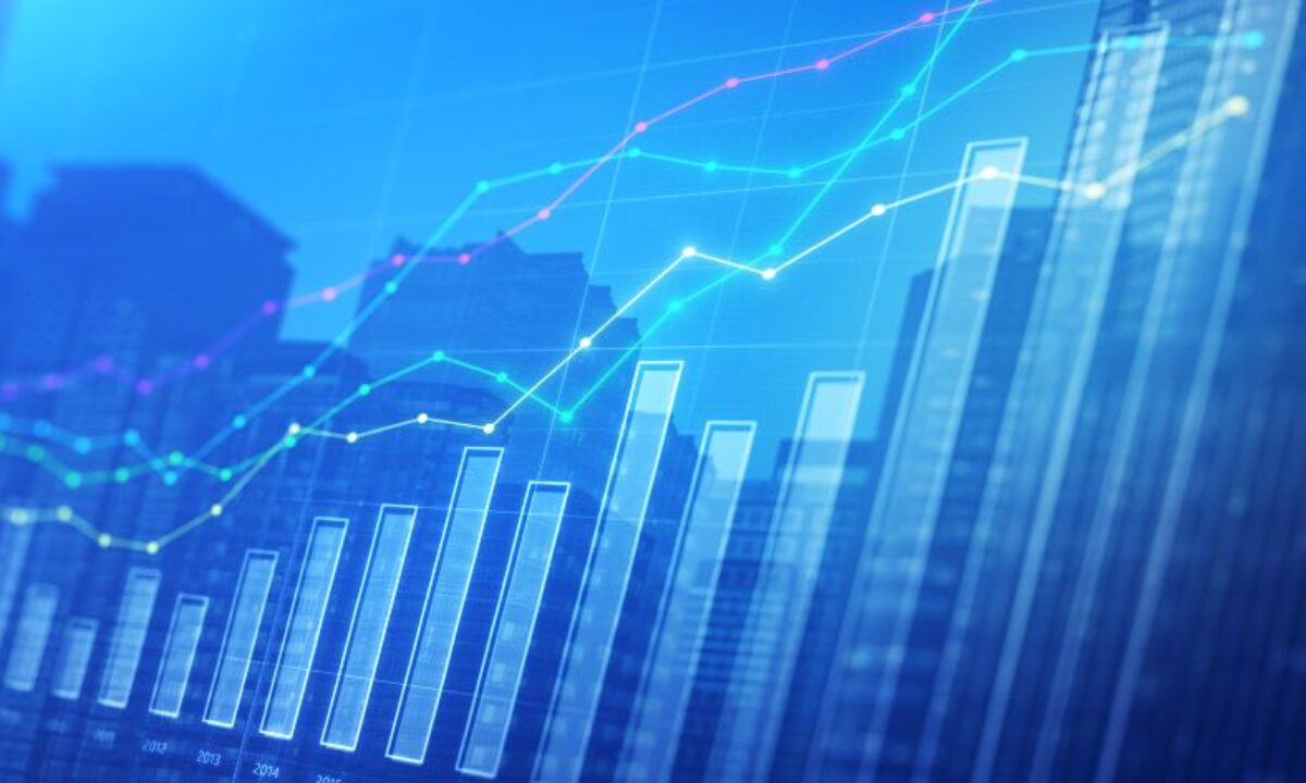 The image shows a digital financial graph with rising bar and line charts, representing growth and positive trends in data or markets.