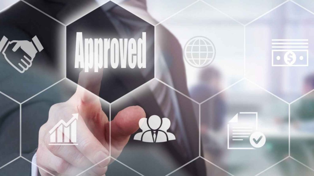The image depicts a person highlighting the word "Approved," symbolizing successful approval or authorization in a professional or financial context.