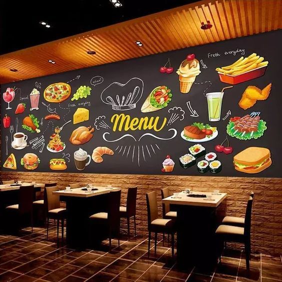 Colorful and inviting restaurant menu chalkboard with various illustrated food items and the word "Menu" at the center.