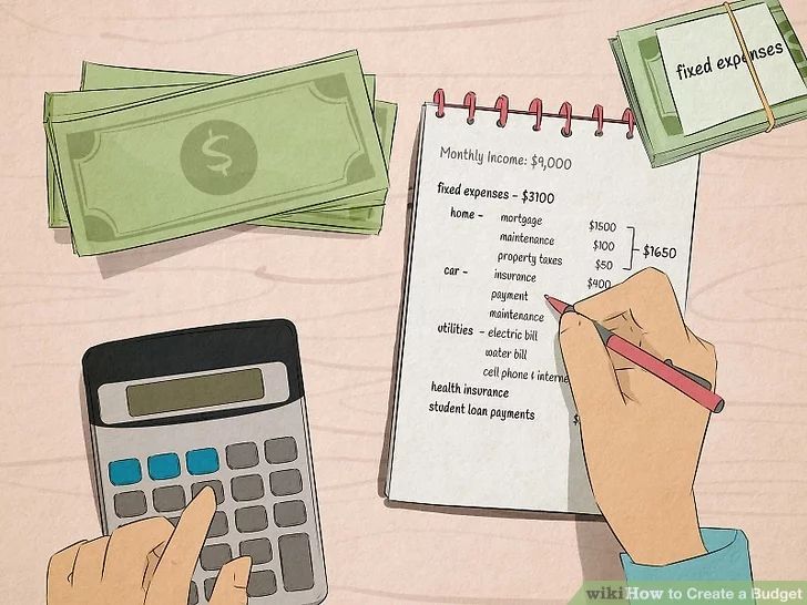 A person calculates expenses using a calculator while listing monthly income and fixed expenses in a budget notebook.