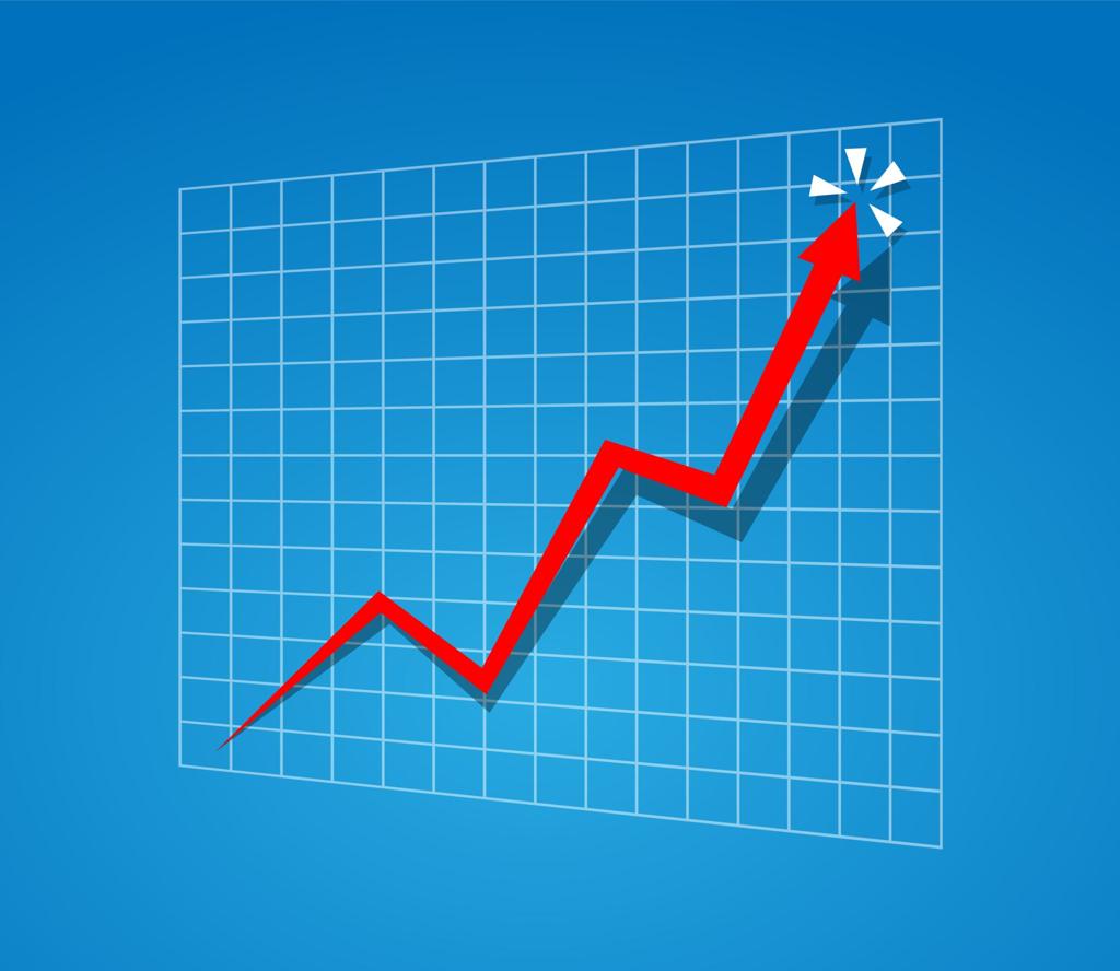 Upward-trending red arrow on a financial graph representing business growth, increased revenue, and funding opportunities through business loans in Arkansas.